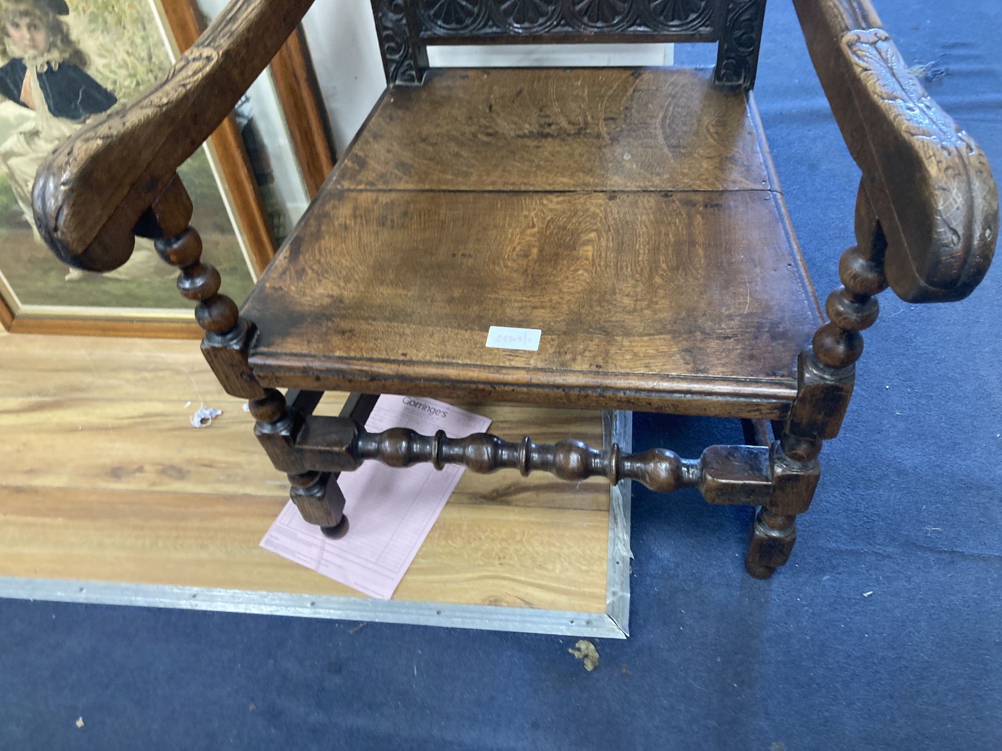 A 19th century oak Wainscot chair, width 64cm depth 49cm height 110cm